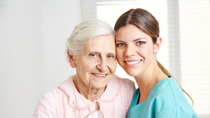 caregiver and old woman